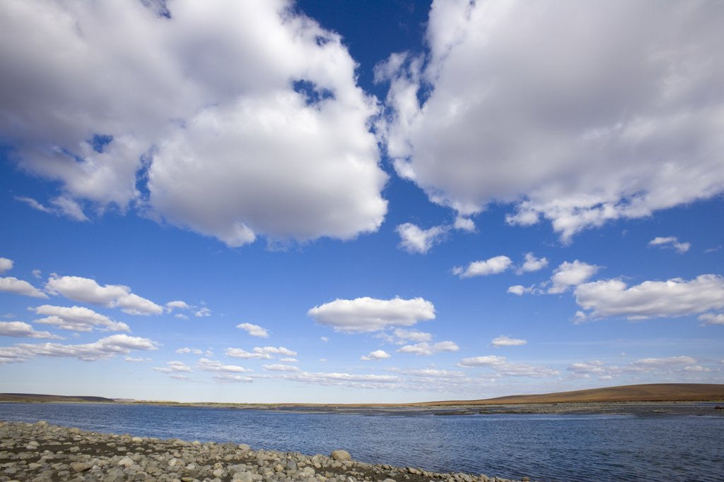 Detail of Cloudy Sky Over Body of Water by Anonymous