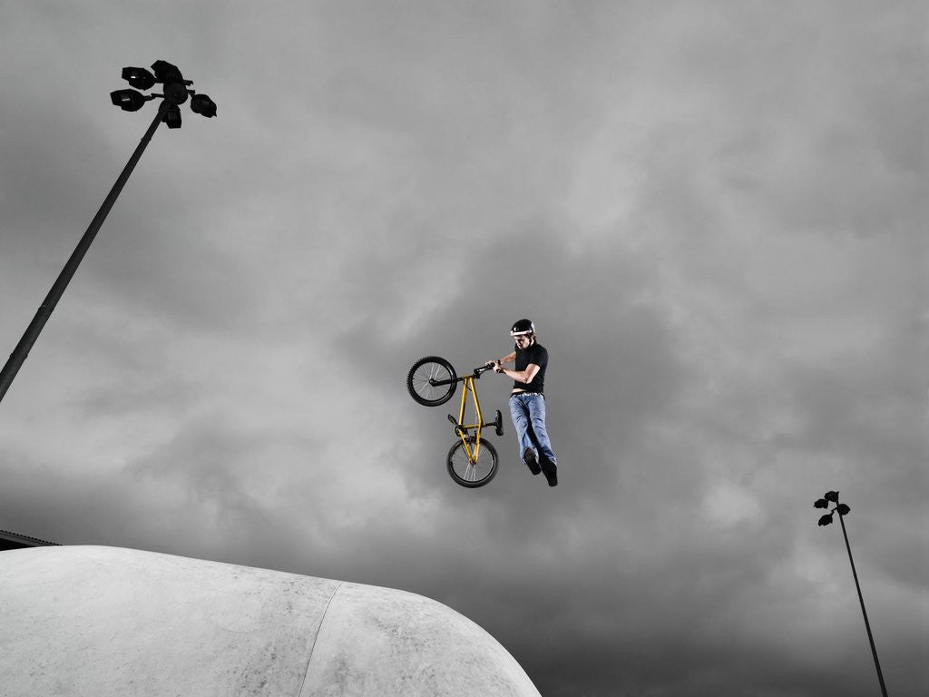 Detail of BMX Biker Performing Tricks by Anonymous