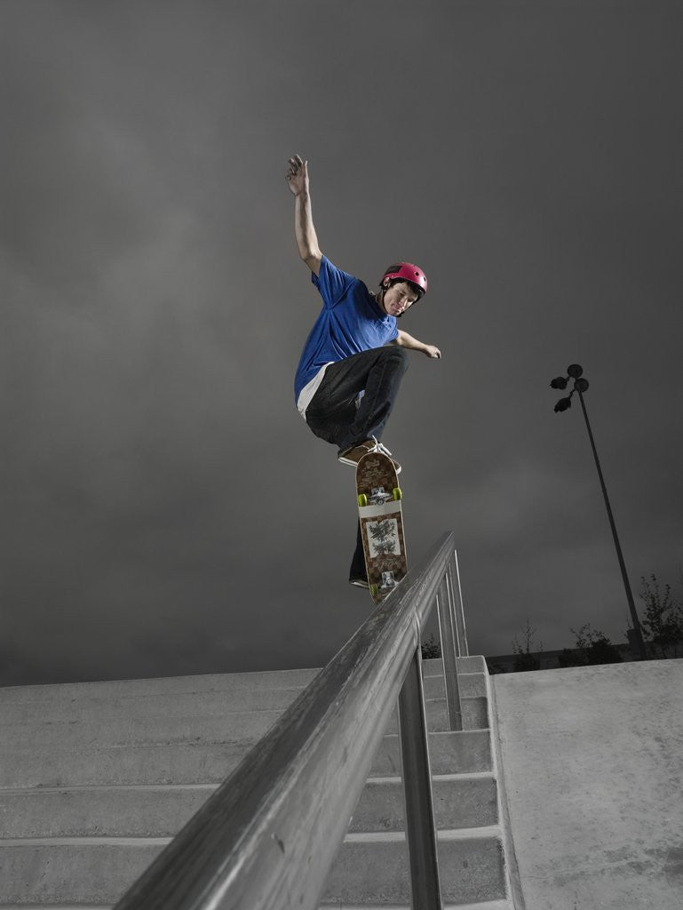 Detail of Skateboarder Performing Tricks by Corbis