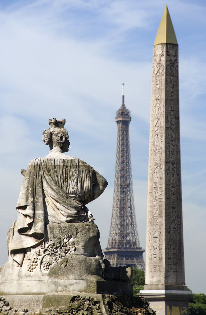 Detail of Statue with the Obelisk of Luxor and the Eiffel Tower in the Background by Anonymous