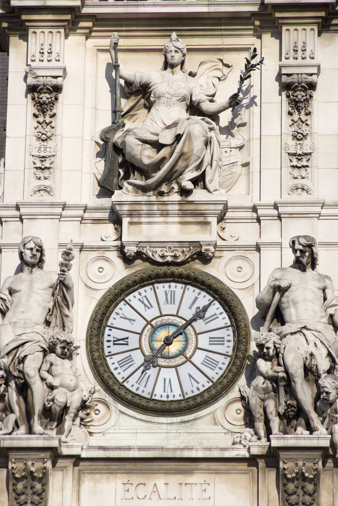 Detail of Clock on Facade of Notre Dame Cathedral by Corbis