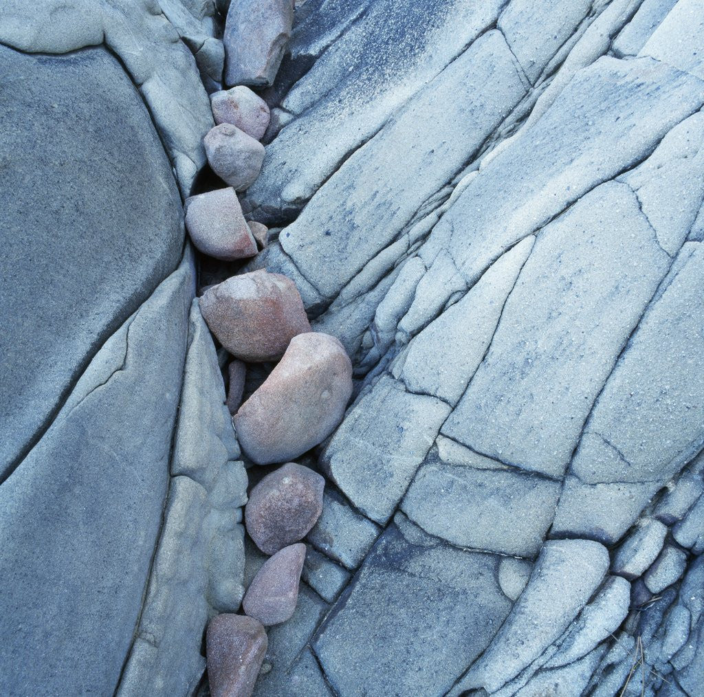 Detail of Rocks Against Cracked Boulder by Anonymous
