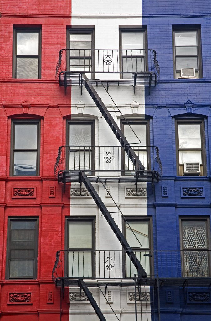 Detail of Red, White, and Blue Apartment Building by Corbis