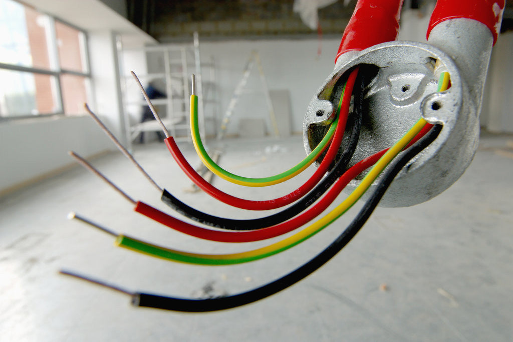 Detail of Electrical Wiring in Refurbished Warehouse by Corbis