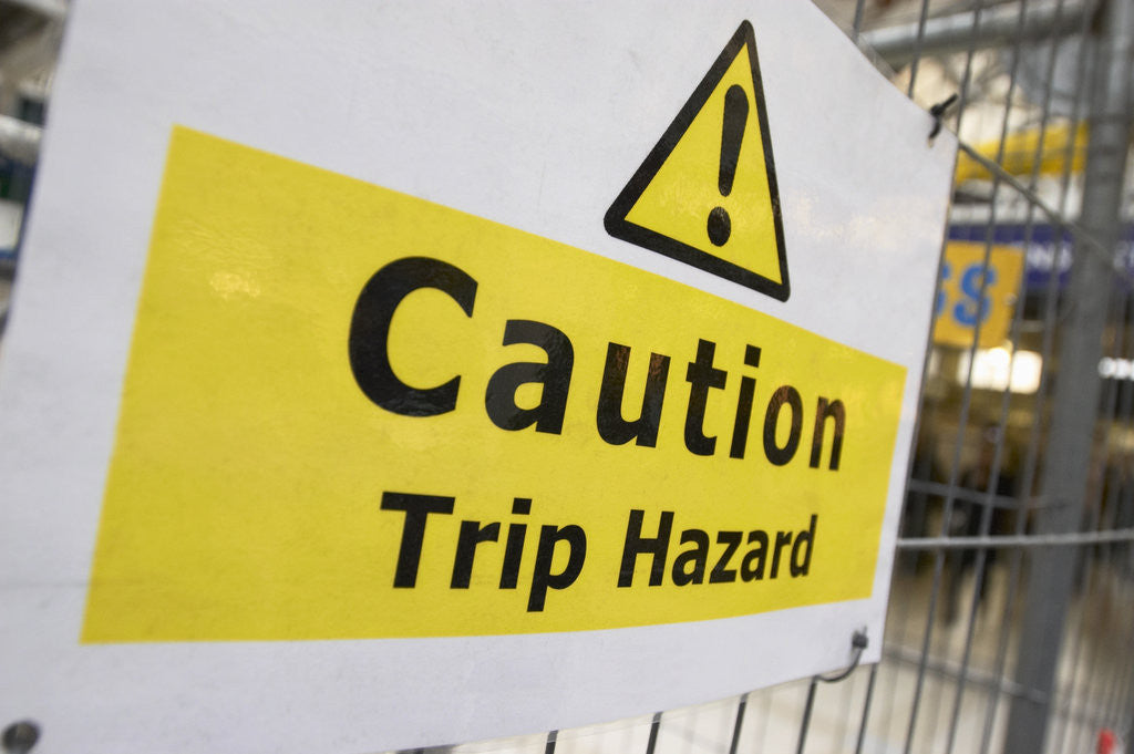 Detail of Caution Trip Hazard Sign on Construction Site by Anonymous