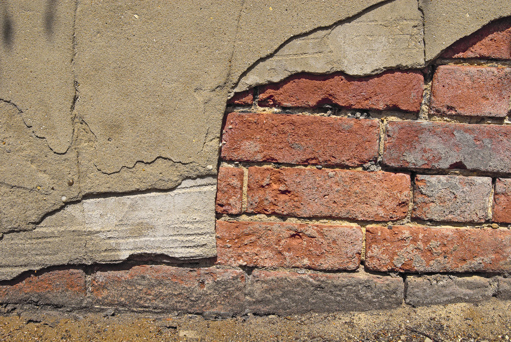 Detail of Brick Wall Part Covered By Plaster by Anonymous