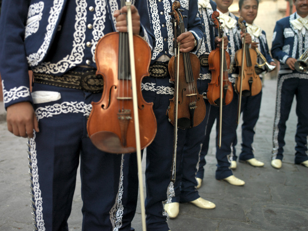 Detail of Mariachi Violin Players Line Up by Anonymous