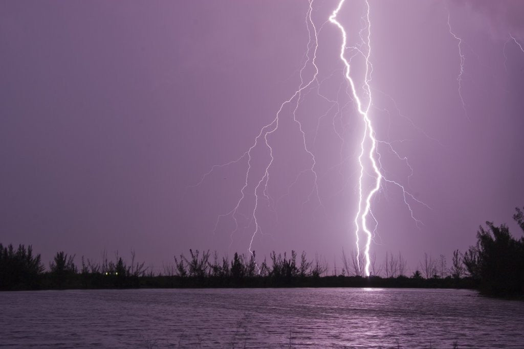 Detail of Lightning Striking near Lake by Corbis