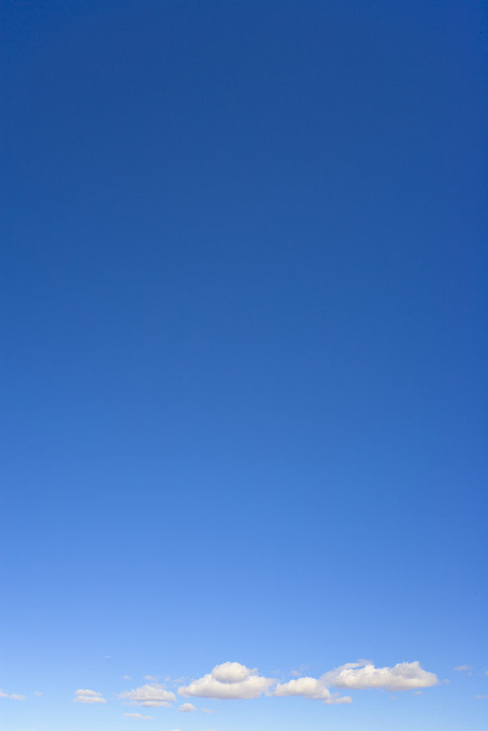 Detail of Small Cumulus Clouds in Blue Sky by Anonymous