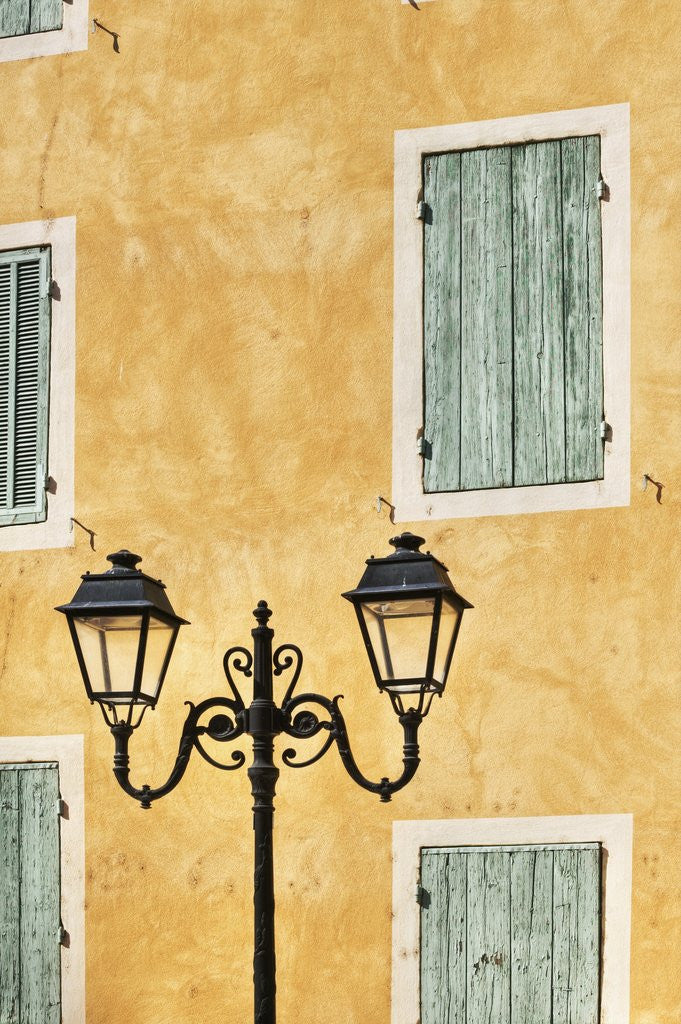 Detail of Street Light and Typical Provencal Architecture in Orange by Corbis