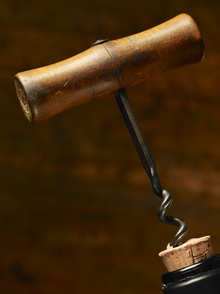 Detail of Old-Fashioned Corkscrew Uncorking Bottle by Corbis