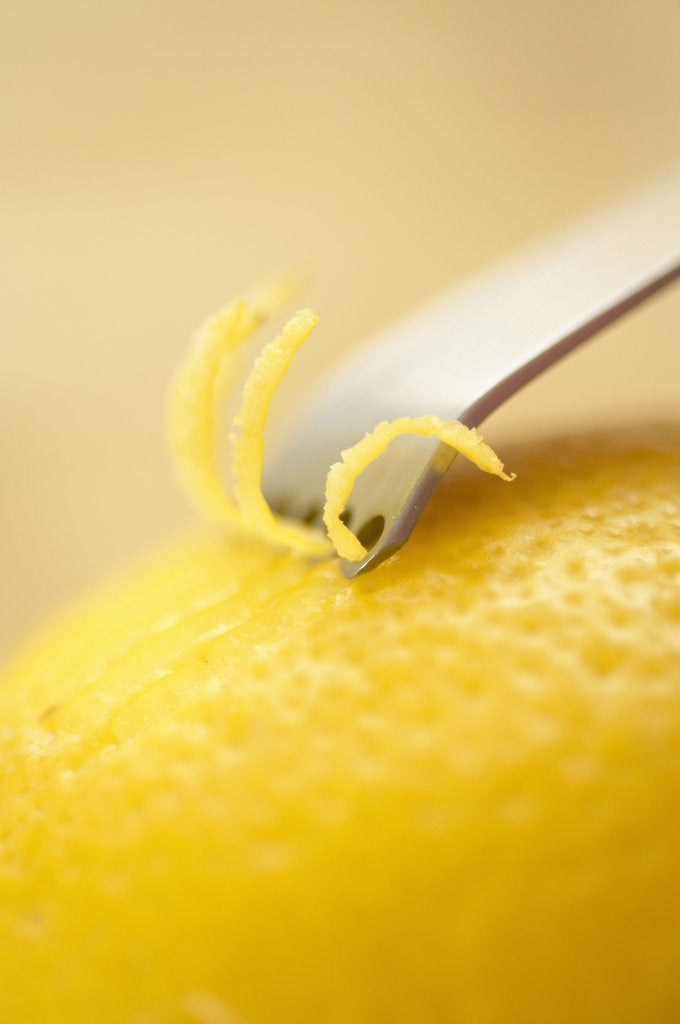 Detail of Lemon Zester on Lemon by Corbis