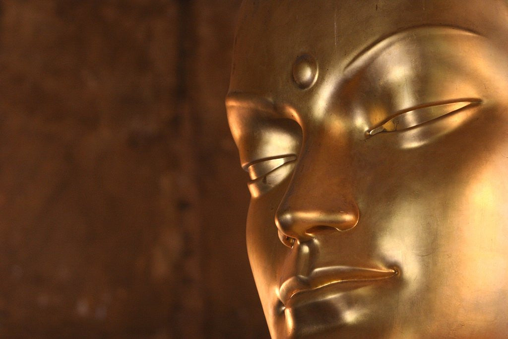 Detail of Buddha Statue in Temple by Corbis