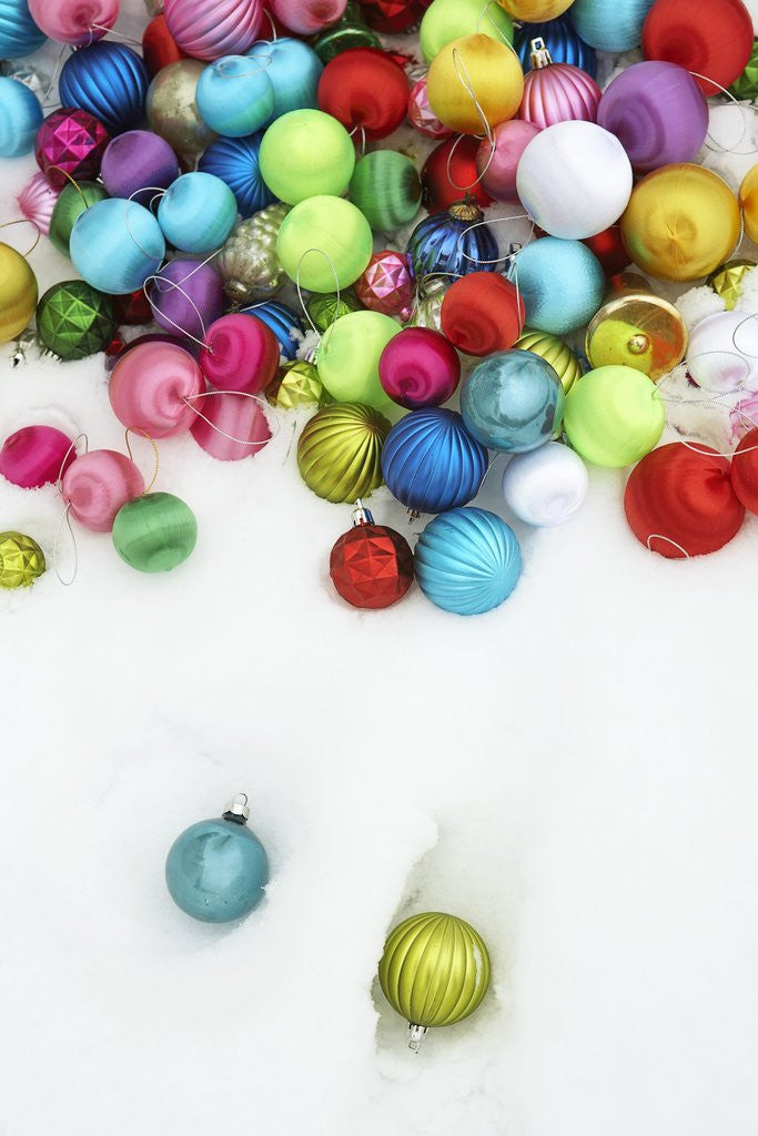 Detail of Christmas ornaments on snow by Anonymous