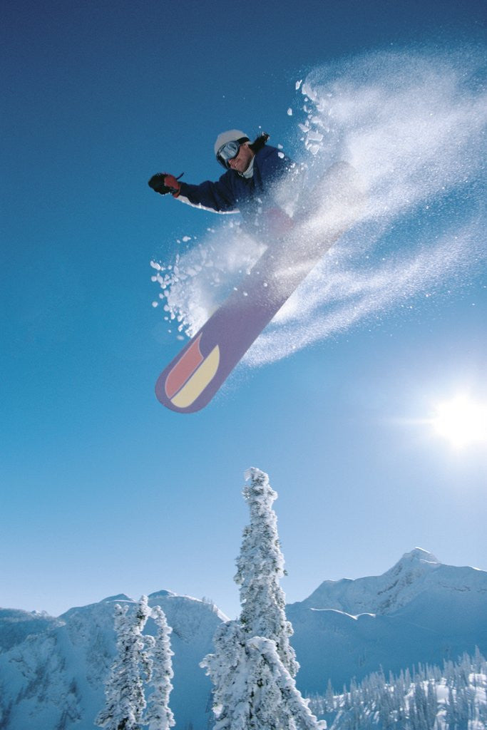 Detail of Man snowboarding on sunnny day by Anonymous