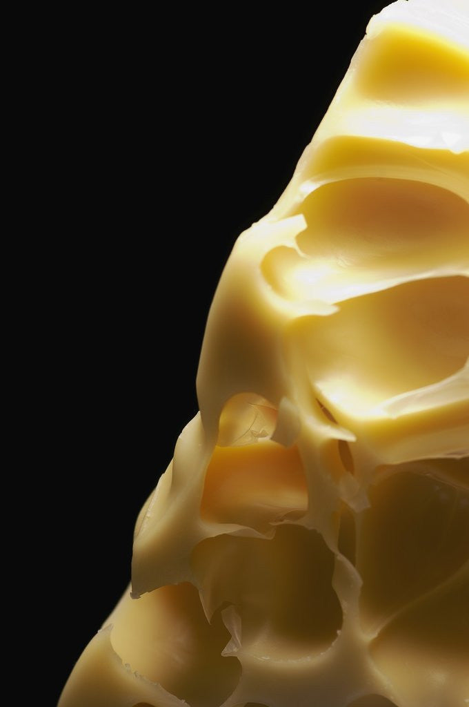 Detail of Swiss cheese by Corbis