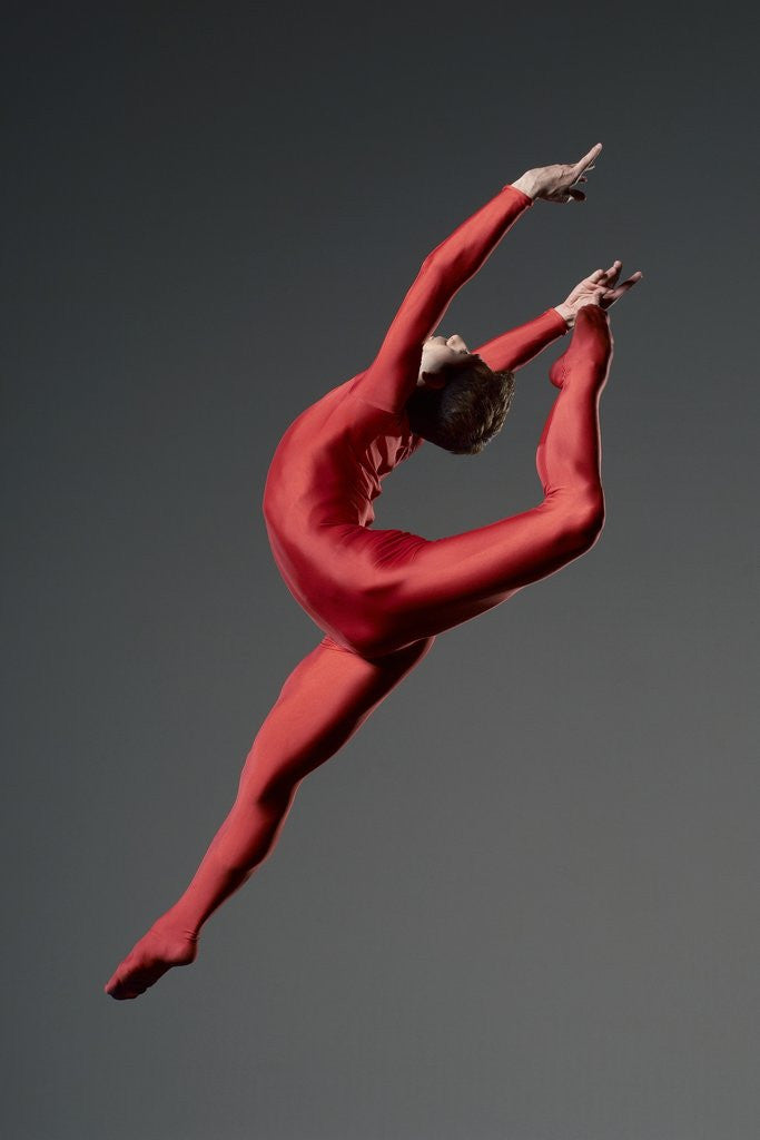 Detail of Ballet dancer in red leotard by Corbis