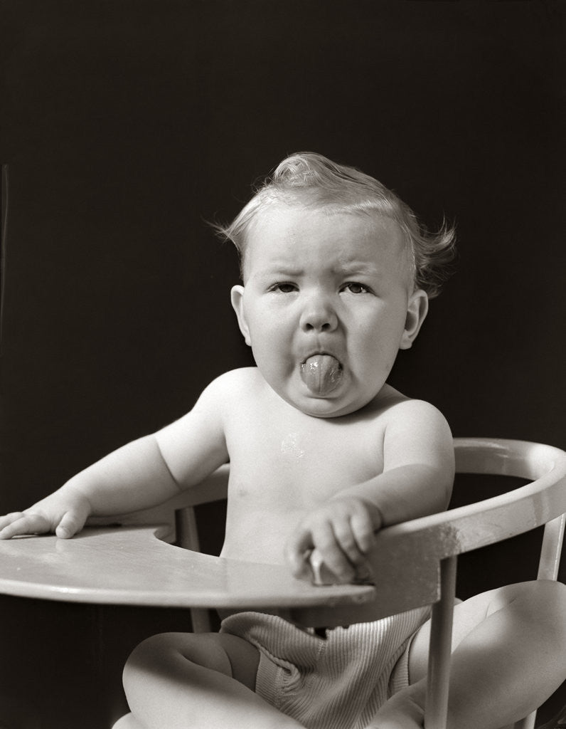 Detail of 1930s 1940s Portrait Of Baby Sticking Tongue Out by Anonymous