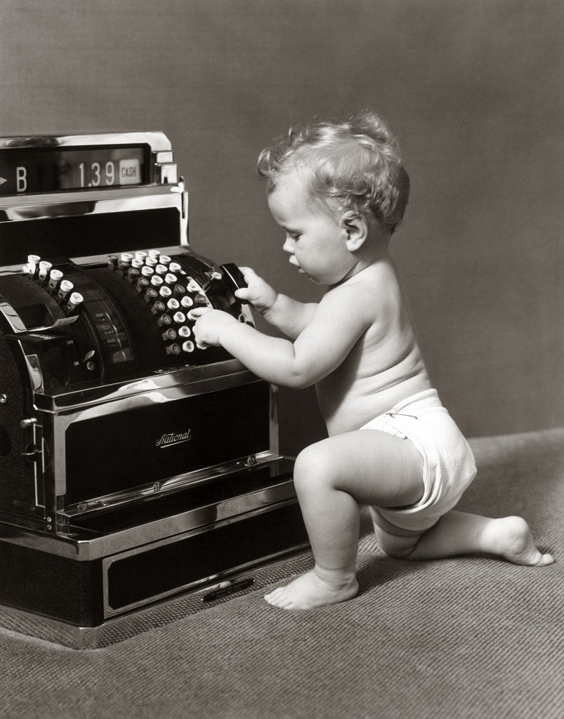 Detail of 1940s 1930s Salesperson Baby Wearing Diaper Ringing Up Sale On Cash Register by Anonymous