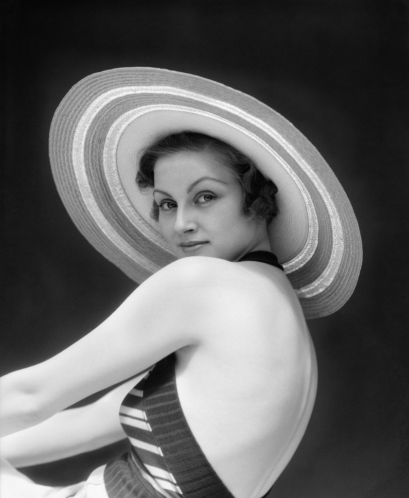 Detail of 1930s Woman Wearing Halter Top and Straw Hat by Anonymous
