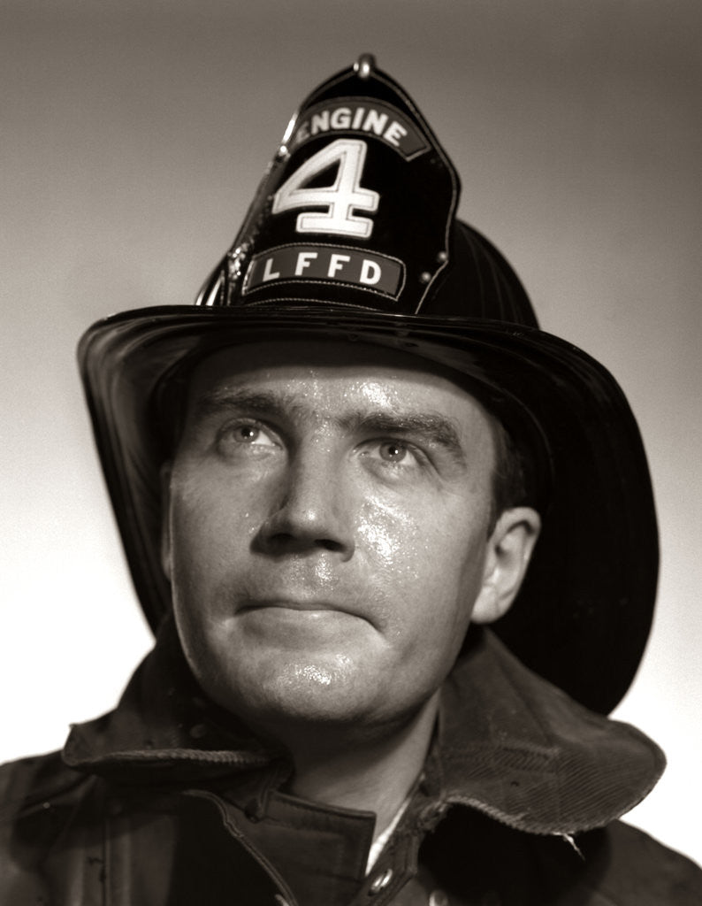 Detail of 1950s Portrait Fireman Serious Expression Metal Fire Hard Hat Engine 4 by Anonymous