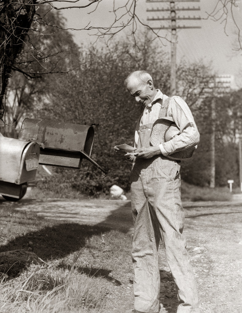 Detail of 1930s Elderly Farmer Checking Mail Mailbox Retro by Corbis