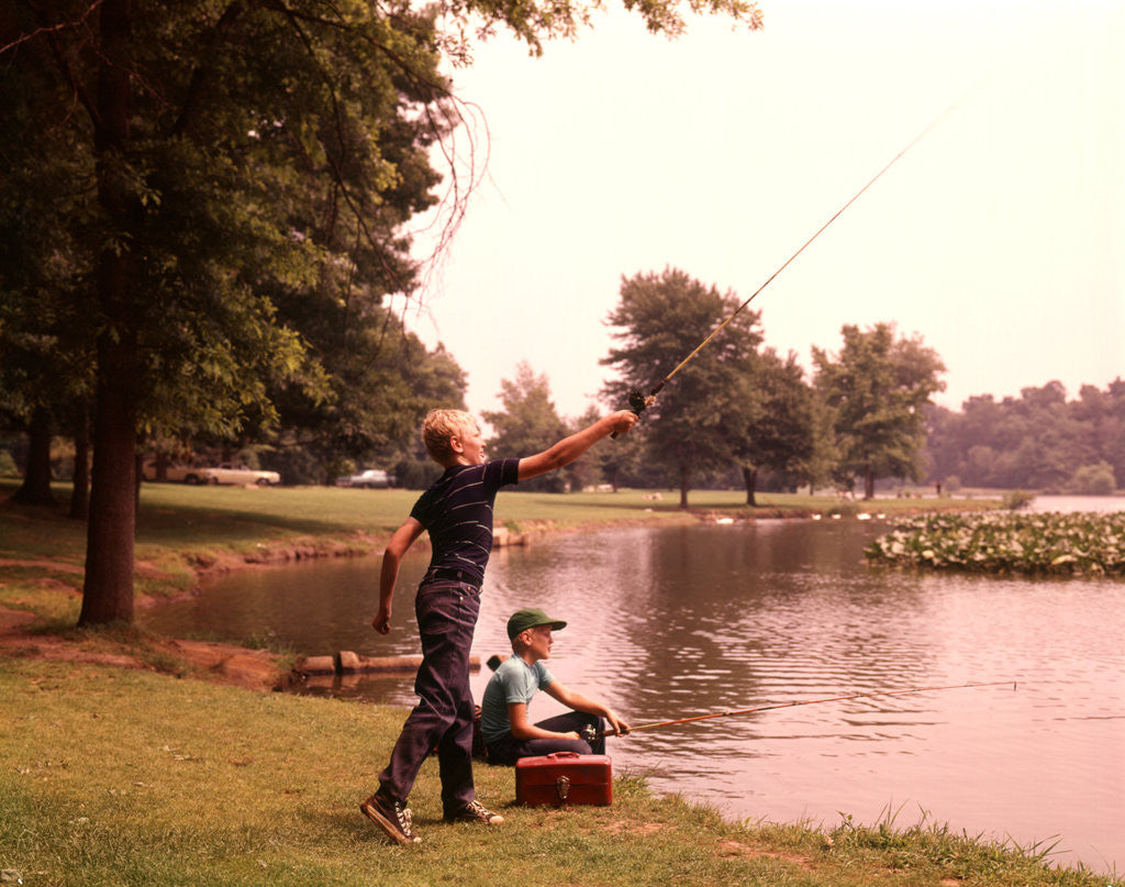 Detail of 1960s 1970s Boys Fishing Casting Casting Into Pond by Corbis