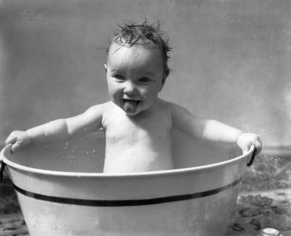 Detail of 1930s Wet Baby In Washtub Sticking Out Tongue by Anonymous