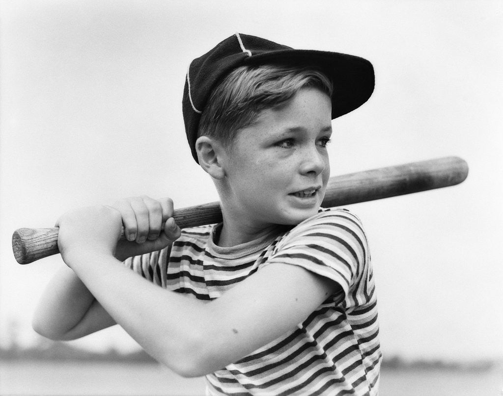 Detail of 1930s Boy At Bat Wearing A Horizonal Striped Tee Shirt and Baseball Cap by Corbis
