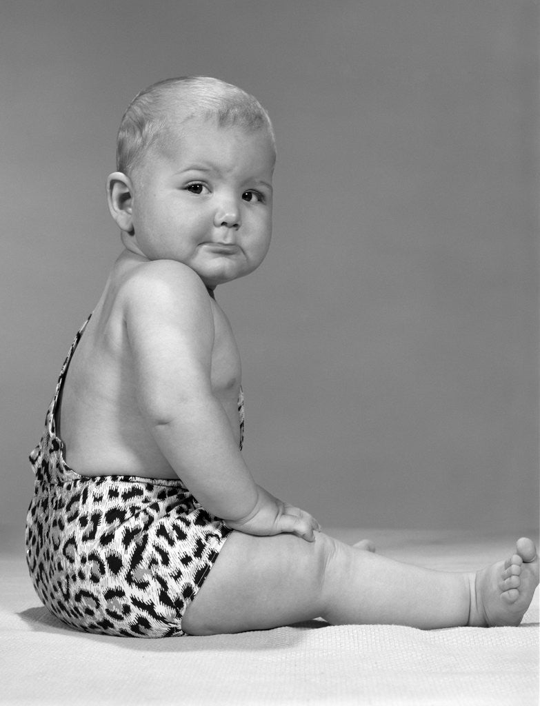 Detail of 1960s Baby In Leopard-Spotted Tarzan Strongman Caveman Costume by Corbis