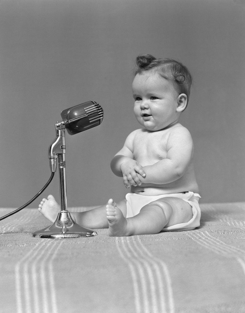 Detail of 1940s Baby In Diaper With Microphone Studio by Anonymous