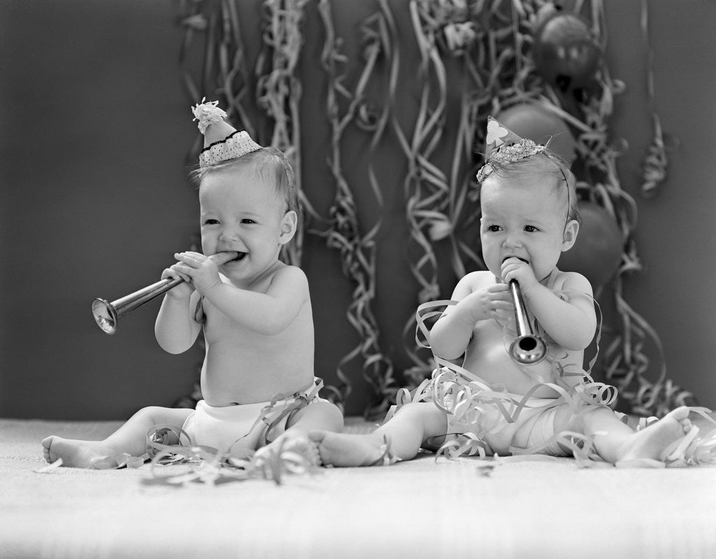 Detail of 1940s Twin Babies With Party Hats Horns And Paper Streamers New Year Celebration Studio by Anonymous
