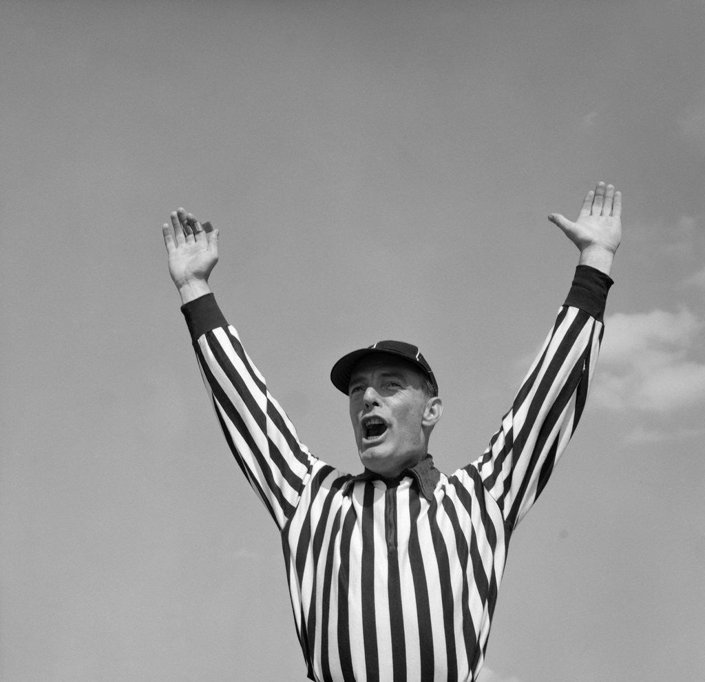 Detail of 1950s Football Referee Making Touchdown Signal by Anonymous