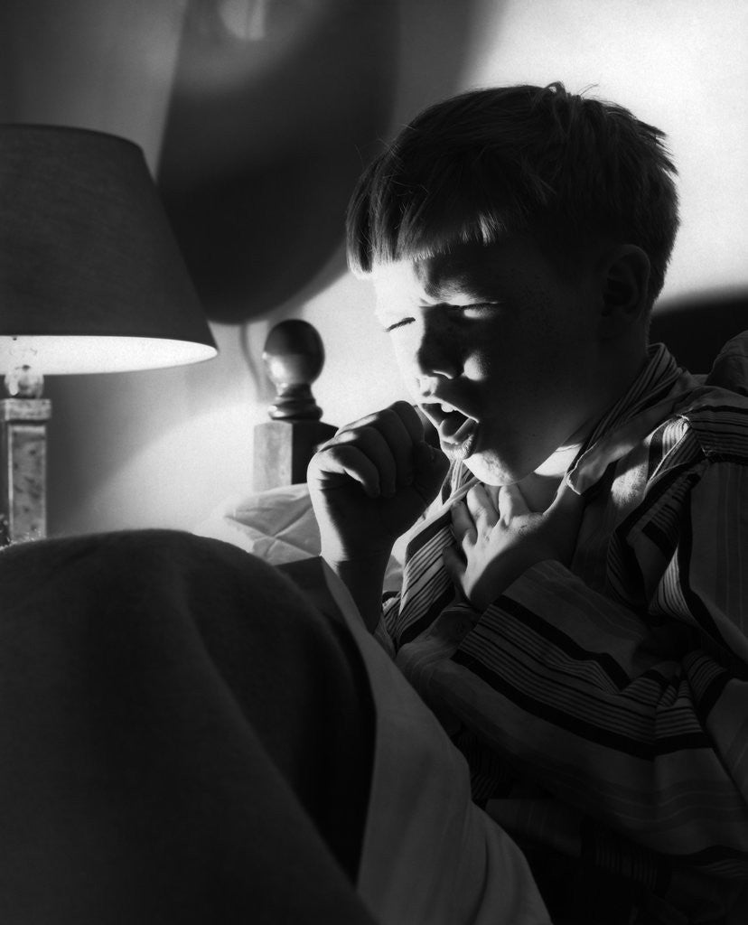 Detail of 1950s 1960s Boy Bed Cold Night Coughing Sneezing Cough by Anonymous