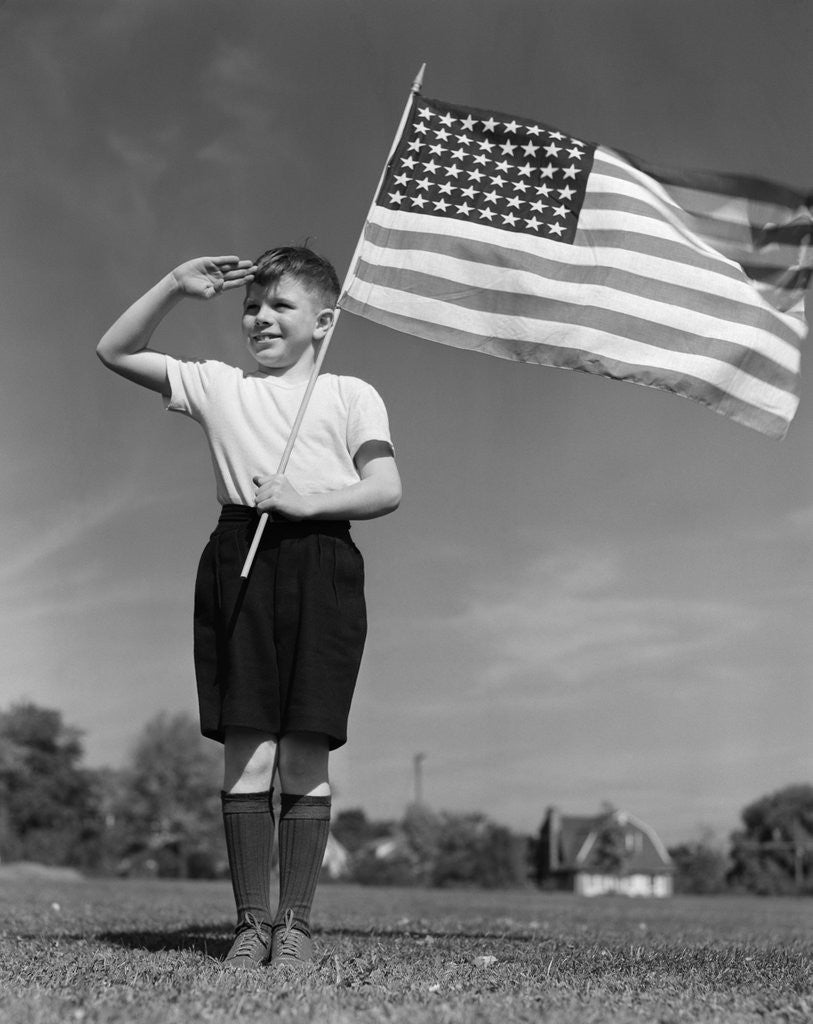 Detail of 1940s Boy Holding American Flag Saluting Wearing Short Pants by Anonymous