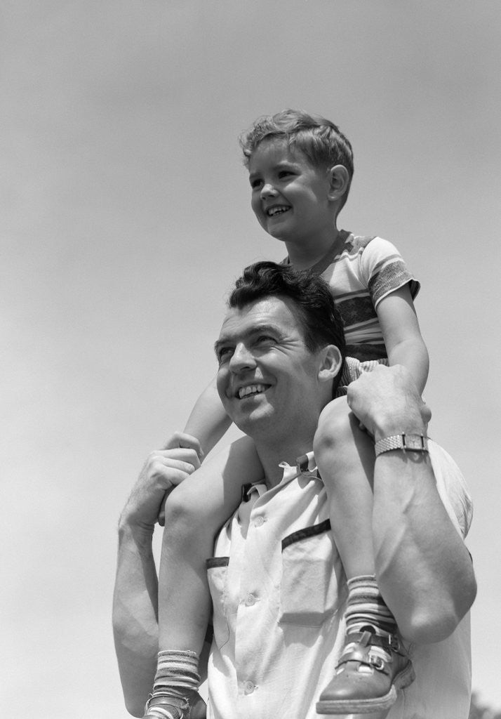 Detail of 1950s Father Carrying Son On Shoulders Outdoor by Anonymous