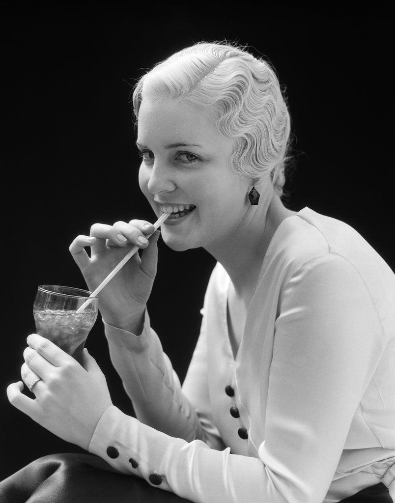 Detail of 1930s Woman Drinking Soda With A Straw by Anonymous