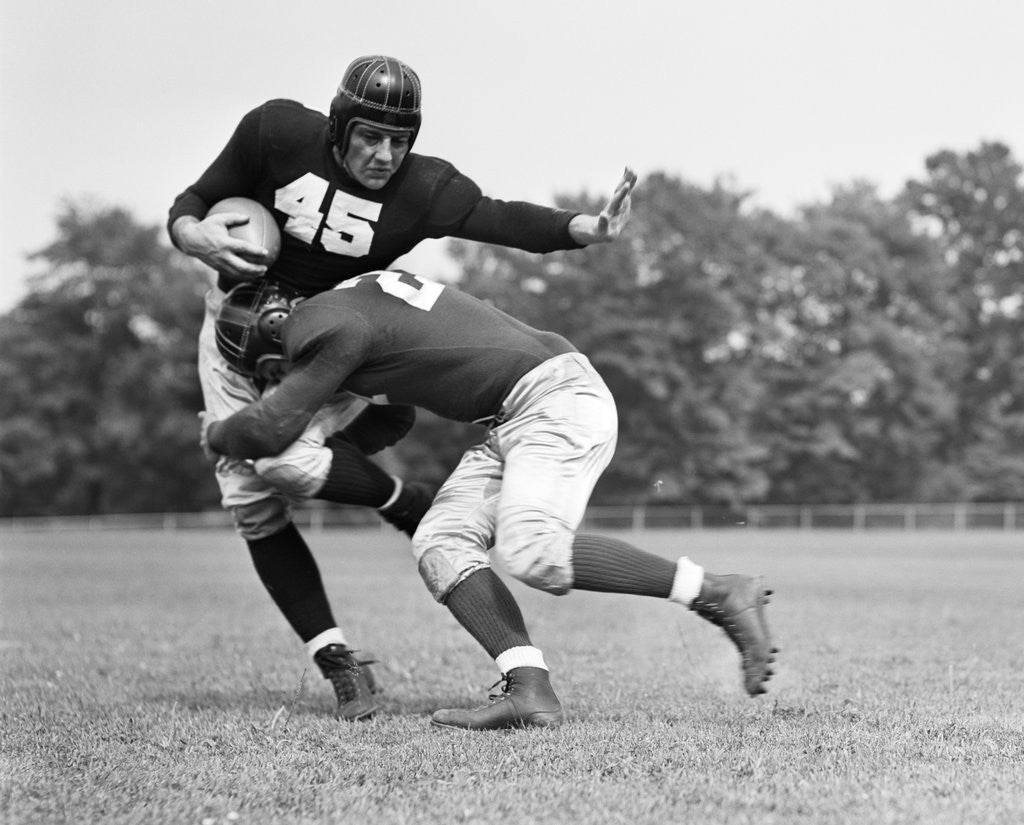 Detail of 1940s Football Player Being Tackled by Anonymous
