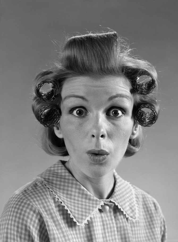 Detail of 1960s Portrait Woman With Hair In Rollers Eyes Wide With Suprise by Anonymous
