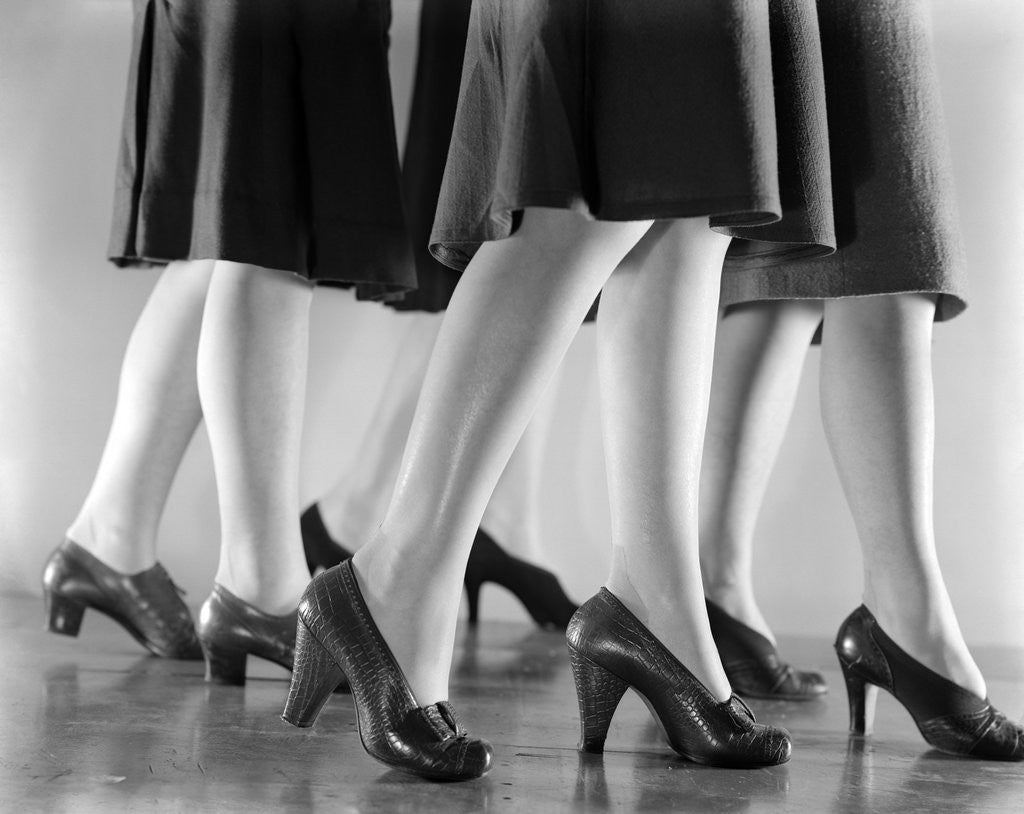 Detail of 1940s Women Legs Only Walking High Heeled Shoes by Anonymous