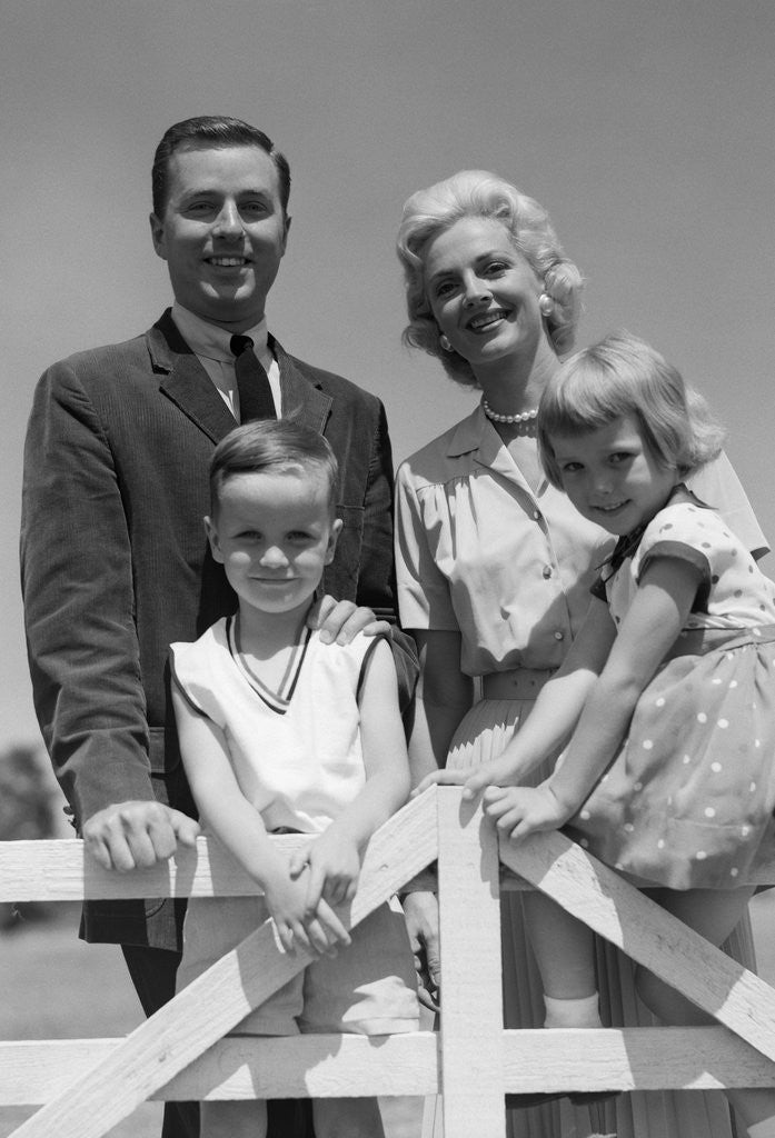 Detail of 1950s 1960s Portrait Family Father Mother Son Daughter Behind White Fence Outdoor by Anonymous
