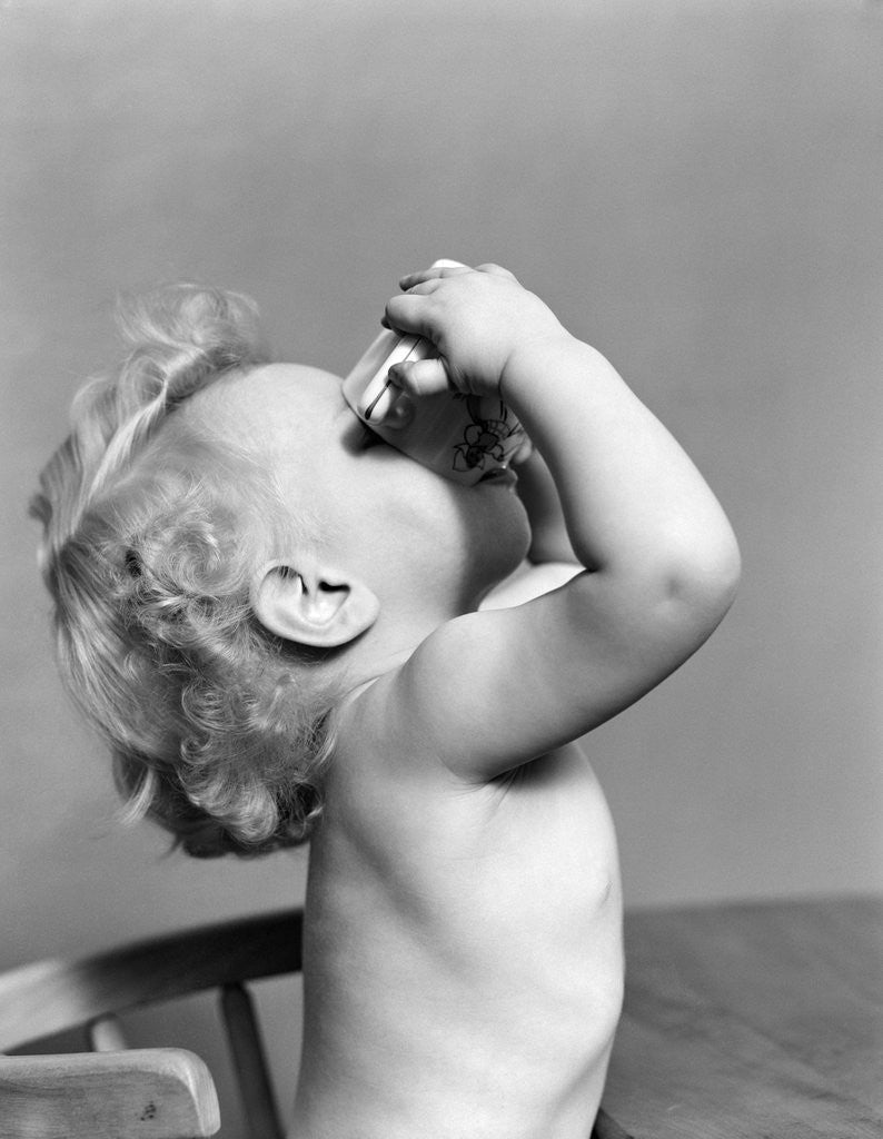 Detail of 1940s Baby Drinking From Cup by Anonymous