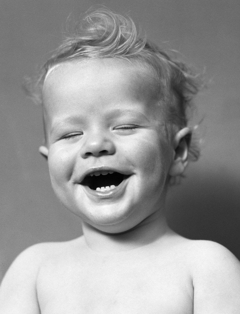 Detail of 1940s Portrait Baby With Messy Hair Laughing With Eyes Closed by Anonymous