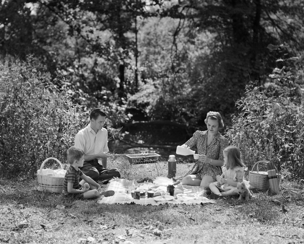 Detail of 1940s Family Mother Father Son Daughter Picnicking With Barbecue Grill In Park by Anonymous