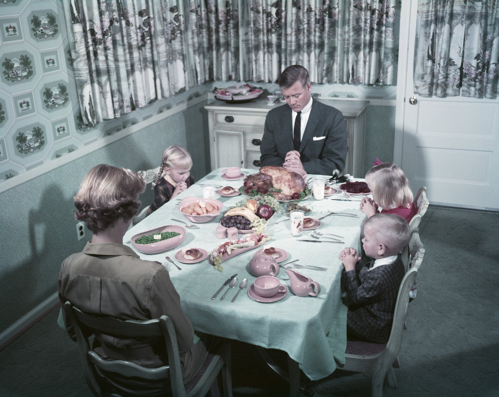 Detail of 1950s Family Of 5 Saying Grace Before Thanksgiving Turkey Dinner Mother Father 3 Children by Corbis
