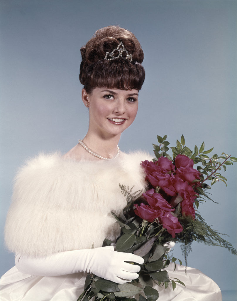 Detail of 1960s Young Woman Wearing Crown White Fur Stole Gloves Holding Bouquet Of Red Roses by Corbis
