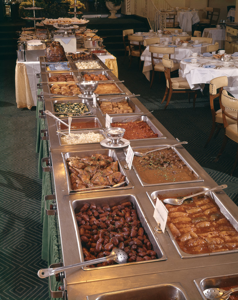 Detail of 1950s 1960s Buffet Of Hot Dinner Foods In Banquet Room Dessert Table In Background by Anonymous