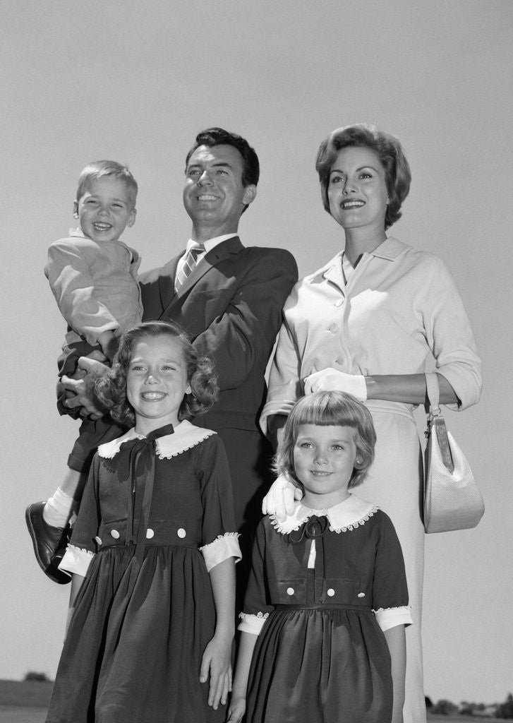 Detail of 1960s Portrait Family Father Mother Two Daughters Son Standing Together Outdoors by Corbis