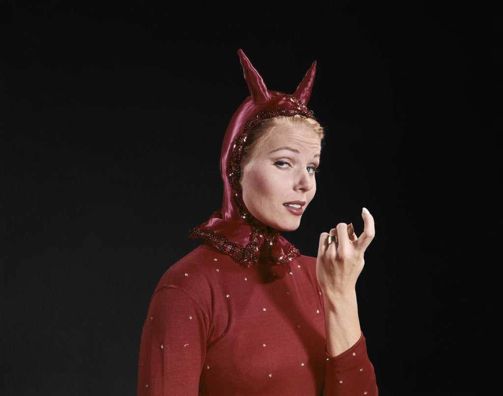 Detail of 1960s Woman Red Devil Costume With Horns Beckoning With Index Finger Come Hither Gesture by Anonymous