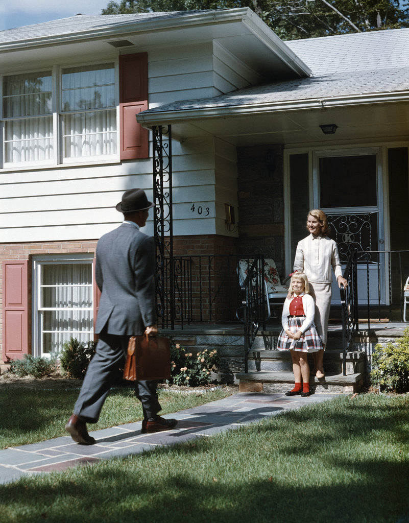 Detail of 1950s Woman and Daughter Waiting At Front Steps For Man Coming Home by Anonymous